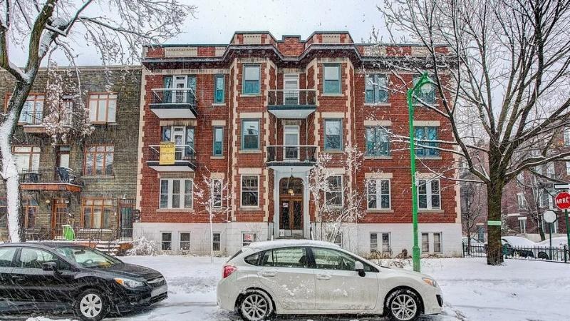 Le Querbes, a classic brick building in Outremont